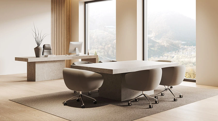 Arredamento ufficio direzionale con scrivania direzionale moderna e tavolo riunione in ambiente luminoso contemporaneo