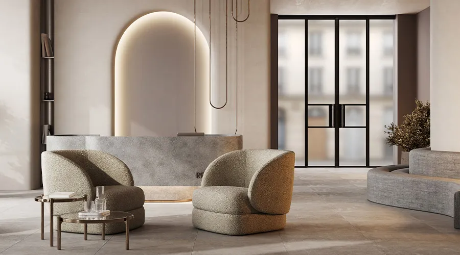 Ingresso ufficio moderno con reception, poltrone lounge e illuminazione soffusa in ambiente raffinato e accogliente